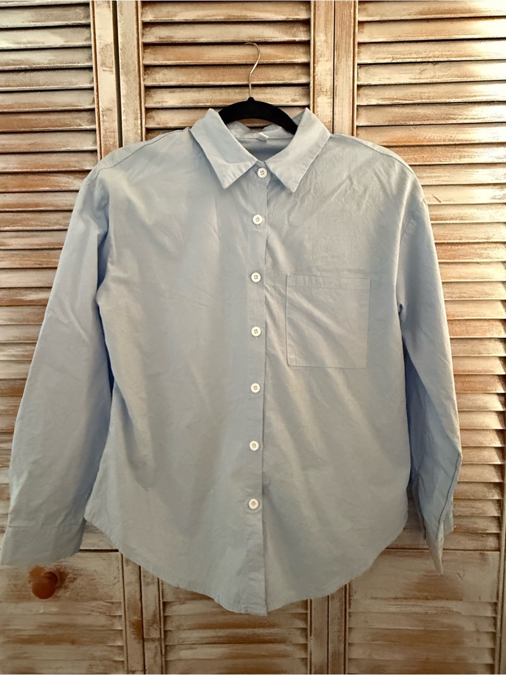 Classic Women's Light Blue Button-Down Shirt with Chest Pocket